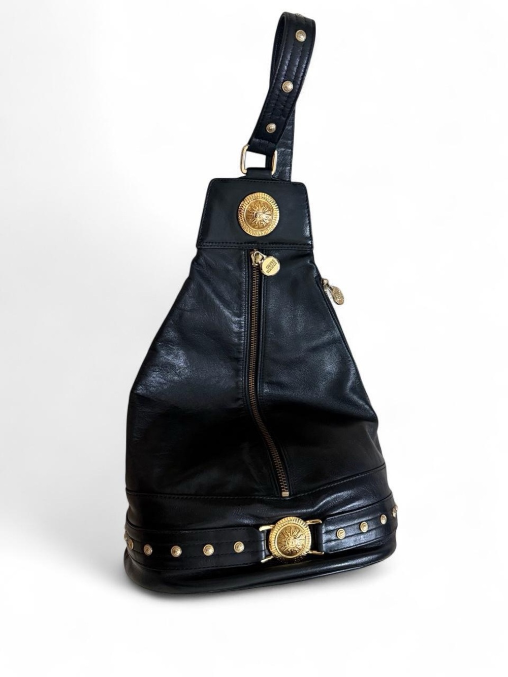 Vintage Gianni Versace leather backpack with gold colored accents